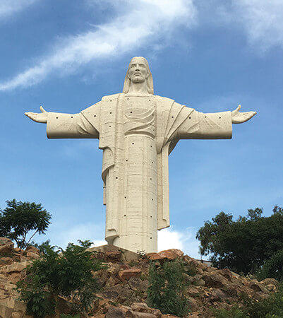 Jesus statue on a hill in Bolivia